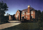 ABOVE: This manor house in suburban Virginia, built by Associated Builders,
looks as though it has been transported intact from the English countryside.
