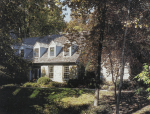 The exterior of this traditional fieldstone and clapboard Cape Cod house gives no clue as to what awaits within.